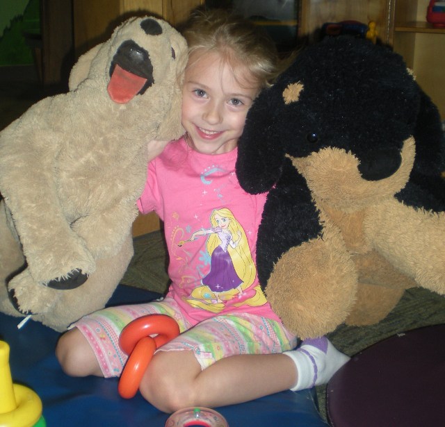 Ania with her stuffed friends